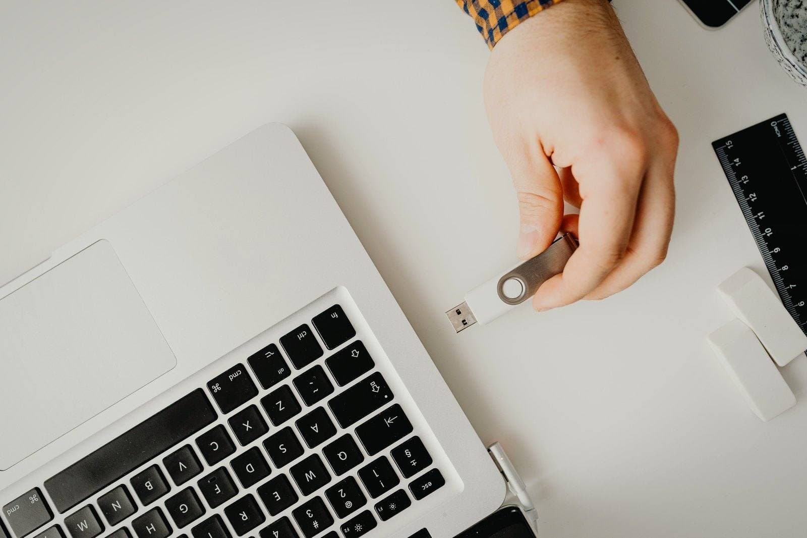 Plugging a USB drive into a laptop